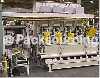 Automatic Bag Placer with Transversing Arm and Duck-Bill